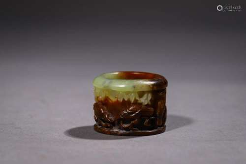 QING: A CARVED JADE ARCHER'S RING