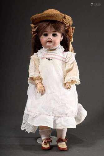 Doll with porcelain crank head an