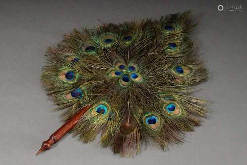 Peacock feather fan with wooden h