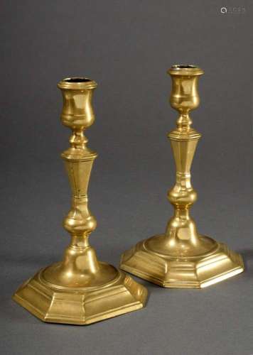 Pair of low brass candlesticks on