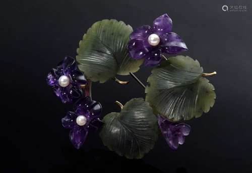 Violet pin in wreath shape on yel