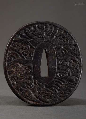 Blackened iron tsuba with relief decoration on both sides &q...