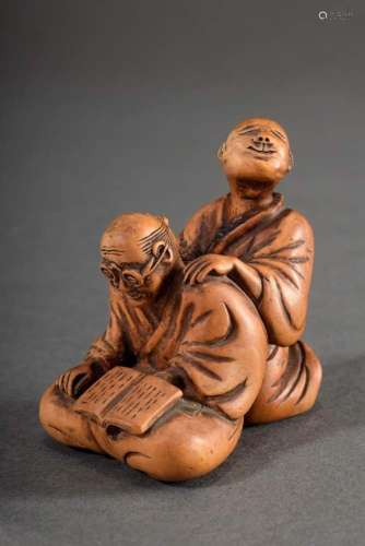 Large finely carved boxwood netsuke "Blind masseur with...