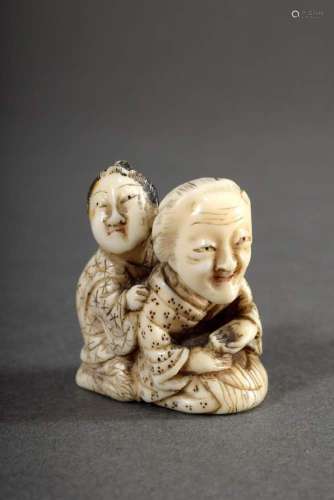Netsuke "Blind masseuse and old woman", staghorn w...