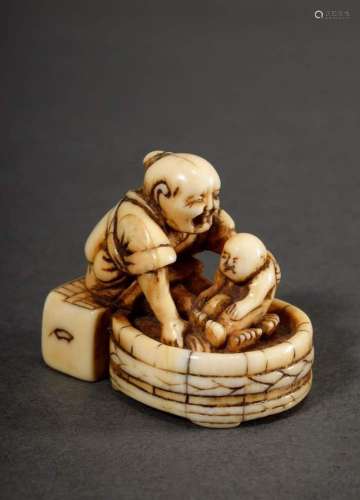 Ivory netsuke "Old woman bathing infant in wooden tub&q...