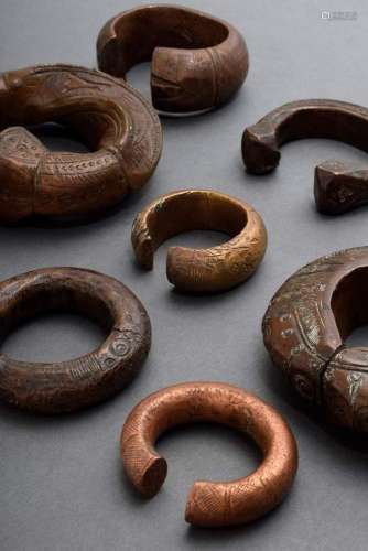 9 Various African bronze manillas in different shapes and si...