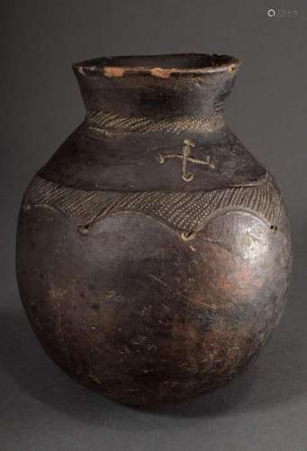 Large clay urn with incised drawing and "cross" mo...