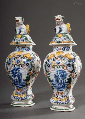 Pair of lidded vases in the Delft style with polychrome flor...