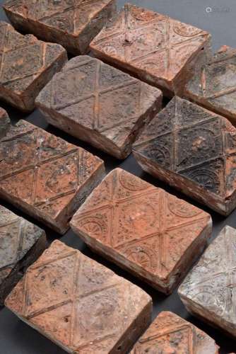 19 Various brick tiles in relief with different ornamental r...