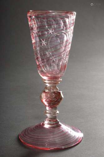 Baroque goblet glass on a wide plate base with baluster stem...