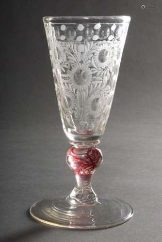 Baroque goblet glass on a broad plate base with red spiral t...