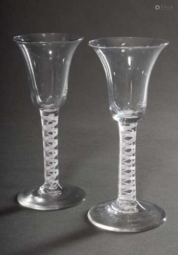Pair of goblets on a round foot with fused white spiral thre...