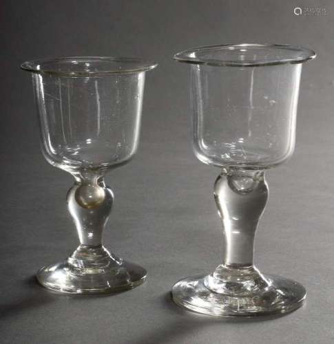 2 Various rustic glasses with flow-through on a round foot w...