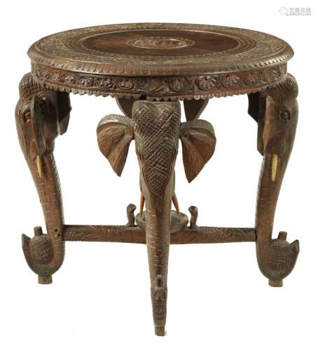 A LATE 19TH CENTURY CARVED INDIAN ELEPHANT TABLE