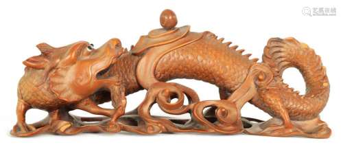 A 19TH CENTURY CHINESE CARVED BOXWOOD CARVED DRAGON