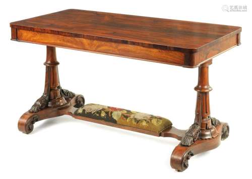 A MID 19TH CENTURY CARVED ROSEWOOD LIBRARY TABLE