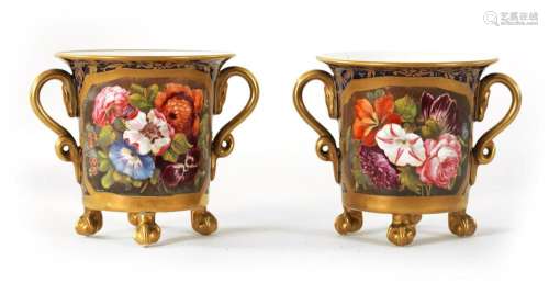 A PAIR OF EARLY 19TH CENTURY DUESBURY DERBY TWO-HANDLED CUPS...