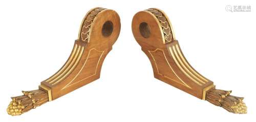 A PAIR OF LATE 19TH CENTURY WALNUT CURTAIN POLE BRACKETS