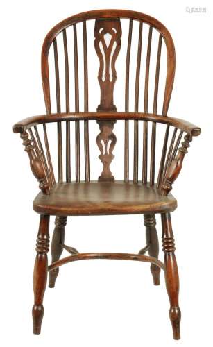 A 19TH CENTURY YEW WOOD AND ELM HIGH BACK WINDSOR CHAIR