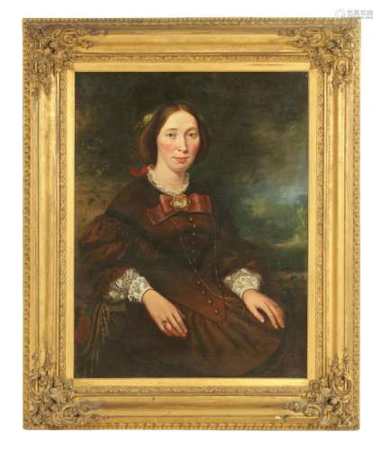 A 19TH-CENTURY OIL ON CANVAS - HALF-LENGTH PORTRAIT OF A YOU...