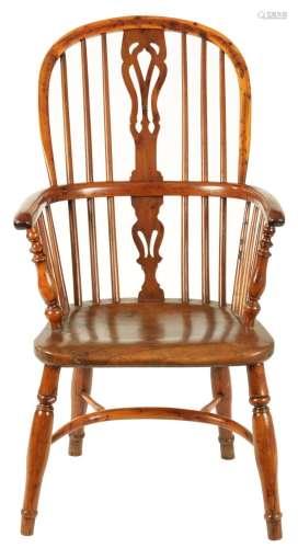 A 19TH CENTURY YEW-WOOD AND ELM HIGH-BACK WINDSOR ARM CHAIR