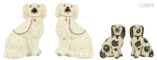 A PAIR OF LATE 19TH CENTURY STAFFORDSHIRE SEATED SPANIEL DOG...