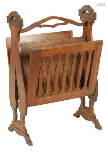 AN EARLY 20TH CENTURY ARTS AND CRAFTS OAK DOUBLE SIDED CANTE...