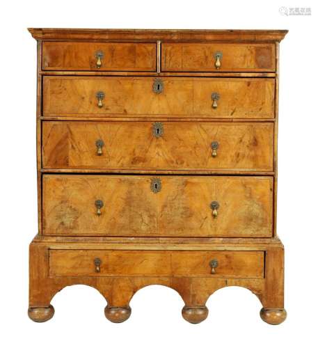 AN EARLY 18TH CENTURY FIGURED WALNUT CHEST RAISED ON STAND