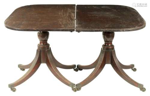 A GEORGE III TWIN PEDESTAL MAHOGANY DINING TABLE