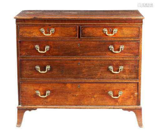 A GEORGE III WALNUT AND MAHOGANY CROSSBANDED CHEST OF DRAWER...