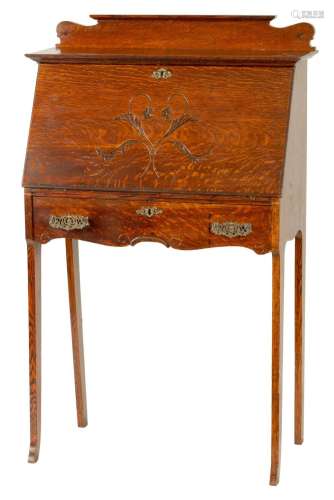 AN ART NOVEAU OAK BUREAU