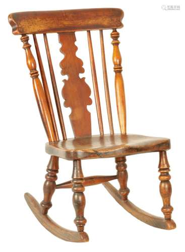 AN UNUSUAL 18TH CENTURY FRUIT WOOD AND ELM ROCKING CHAIR