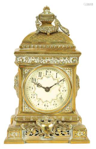 A LATE 19TH CENTURY ORNATE CAST BRASS MANTEL CLOCK