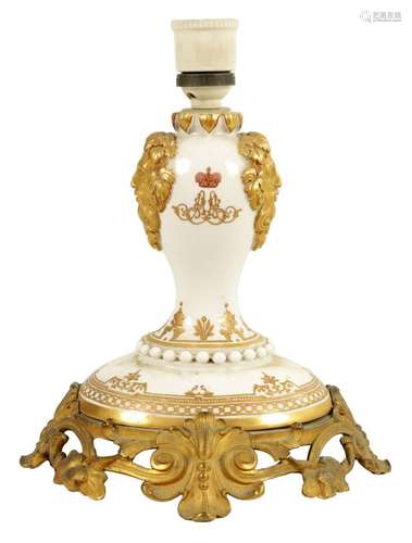 A 19TH CENTURY RUSSIAN PORCELAIN GILT HIGHLIGHTED AND ORMOLU...