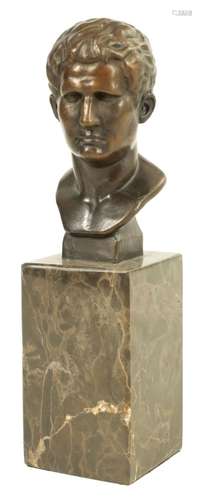 A 20TH CENTURY BRONZE BUST ON MARBLE BASE