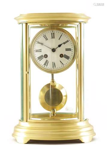 A 19TH CENTURY FRENCH BRASS OVAL FOUR GLASS MANTEL CLOCK