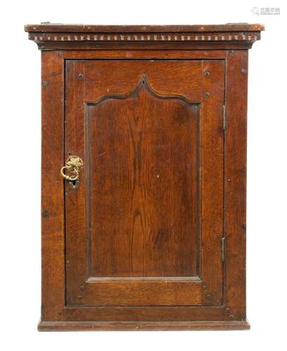 AN 18TH CENTURY OAK HANGING WALL CUPBOARD