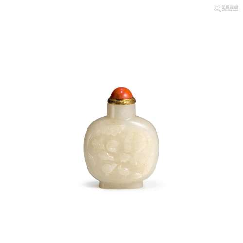 A CARVED WHITE AND RUSSET JADE SNUFF BOTTLE 1750-1820