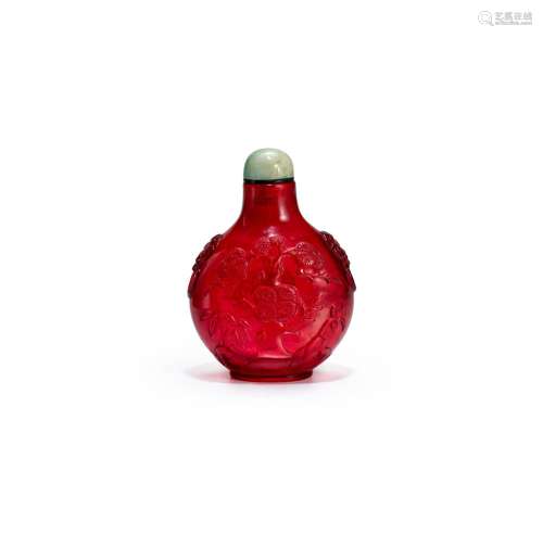 A RUBY-RED CARVED GLASS SNUFF BOTTLE Probably imperial, attr...