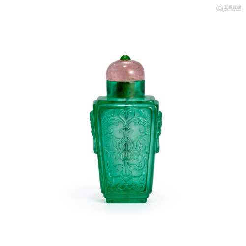 A SUPERB CARVED EMERALD-GREEN GLASS SNUFF BOTTLE Imperial, a...