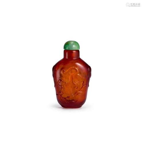 A CARVED AMBER SNUFF BOTTLE 1780 - 1850