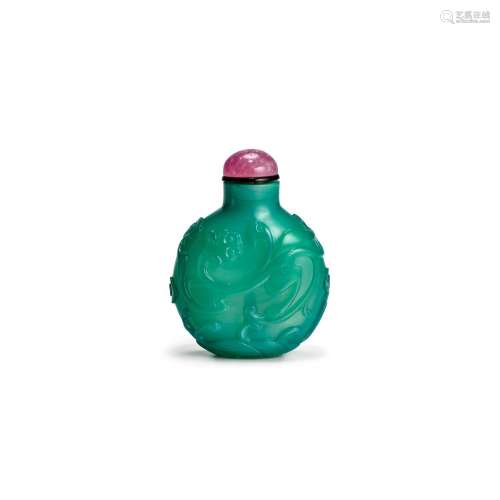 A TEAL-GREEN CARVED GLASS SNUFF BOTTLE Imperial, attributed ...
