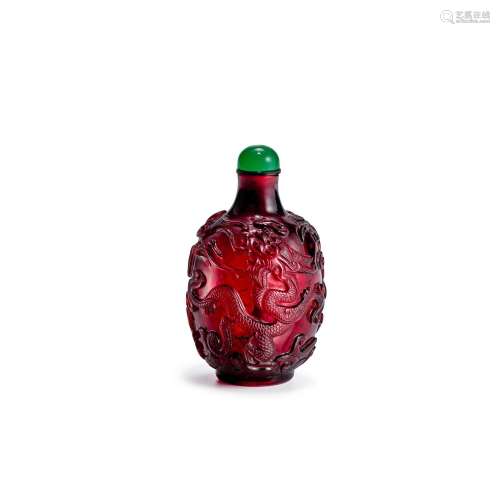 A RUBY-RED CARVED GLASS SNUFF BOTTLE Imperial, attributed to...