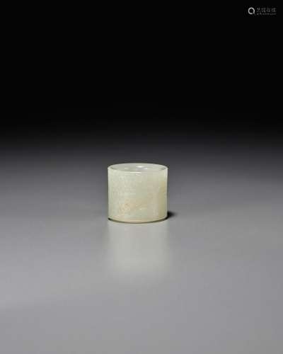 A WHITE JADE ARCHER'S RING 18th century