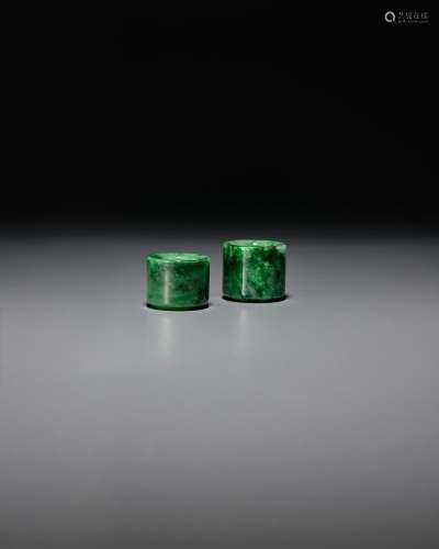 TWO GREEN JADEITE ARCHER'S RINGS 19th century
