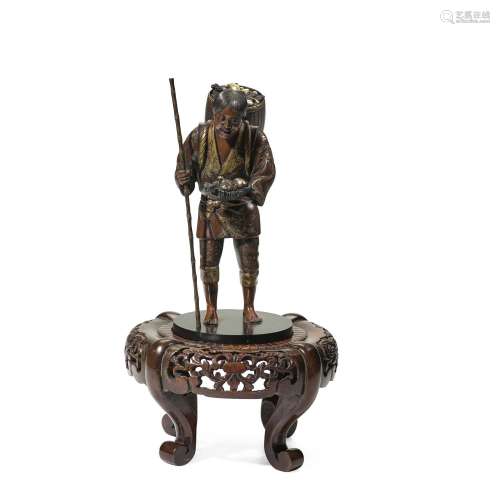 YOSHIMITSU (ACTIVE LATE 19TH CENTURY) A Gilt-Bronze Figure o...