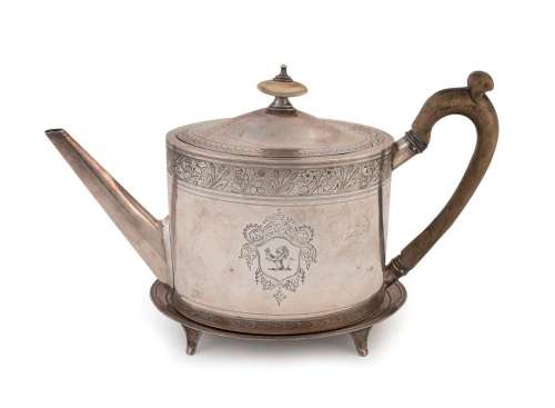 A Georgian teapot, together with a matching four-footed stan...