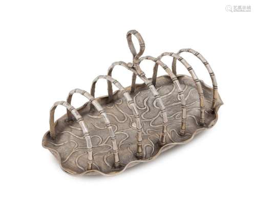 A Chinese silver toast rack of lotus leaf and bamboo form, b...