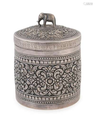 An antique Indian silver tea caddy with elephant finial, 19t...