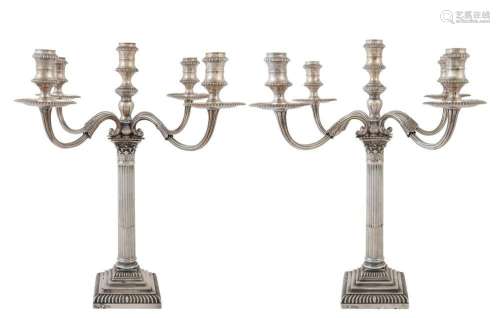 An impressive pair of English sterling silver five branch ca...